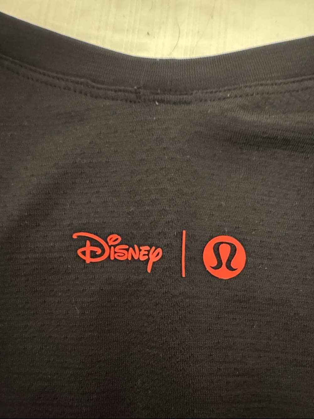 Disney x Lululemon Black Top with Red Logo Detail - Picture 5 of 6